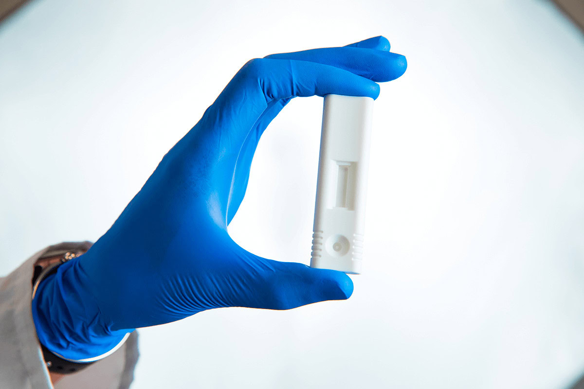 point of care testing,POC testing, point-of-care testing, rapid diagnostics, rapid diagnostic, lateral flow, lateral flow assay, infectious disease diagnostic testing, what is a diagnostic test?, what is a rapid diagnostic test?, what is a lateral flow test?, dcn dx, dcn diagnostics, brendan o'farrell, rapid diagnostic test, what is a rapid diagnostic, what is lateral flow, point-of-need testing, immunoassay, sample collection, sample prep, microfluidics, lateral flow test, Lateral Flow Cassette in Hand, lateral flow cassette, lateral flow assay cassette, DCN Dx, cassette design, assay development, test performance, functionality, mold design, closure process, rapid prototype, user-centric, application-centric, DCNovations LFI Cassette, lateral flow device, lateral flow test, flow patterns, test strip integration, cost-effective, high-performance